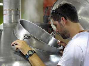 Ben Mills checks the boil of his sour beer.