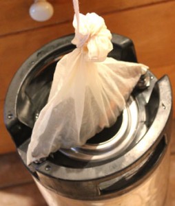 Secondary ingredients are suspended in the beer in a hop bag.