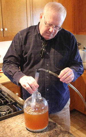 Steve Wilkes expertly mans the auto-siphon.
